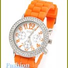 Women's celebrity runway ice accent stones, juicy orange rubber band fashion watch on sale.