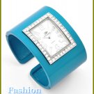 Women's celebrity runway ocean blue, ice gemstones metal cuff fashion watch on sale.