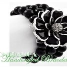 JONFRANCA celebrity runway design, flower and pearl fashion bracelet.