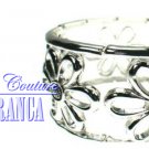 Silvertone flower stretch fashion bracelet with free complimentary gifts by JONFRANCA.