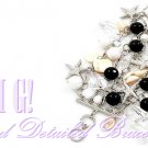 This fabulous fashion bracelet delivers a breezy feel with acrylics nautical charms.