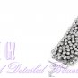 Fashion bracelet that flaunts rhinestones, metalwork, and detailing with rhodiumode finish.