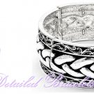 Fashion bracelet is detailed with filigree mesh metalwork and drenched in silvermode finishing.