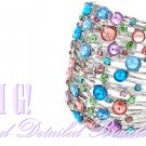 Costume bracelet dazzles with an array of colorful ice rhinestones. Designer jewelry.