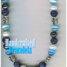 GILVANDIA COUTURE handcrafted African panther eye stones fashion bracelet on sale.