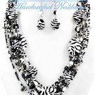 Multi strands of Hampton Hills® acrylic seeds and beads by JONFRANCA CIAGA. Fashion necklaces.