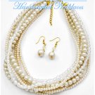 Multi strands of creme Hampton Hills® acrylic balls by JONFRANCA CIAGA. Fashion necklaces.