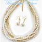 Multi strands of creme Hampton Hills® acrylic balls by JONFRANCA CIAGA. Fashion necklaces.