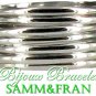 Silvertone designer metal bracelets boasts a set of 7 to do the grand stackable look.