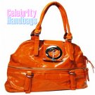 Divine!..Orange patent-leather celebrity handbag by AFFIRMATION on sale now.