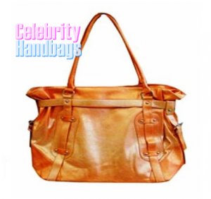 Posh!...Couture designed orange two-tone celebrity handbag by AFFIRMATION on sale now.