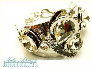 MEDIA ATTENTION  abstract designed, celebrity inspired looking fashion bracelet.