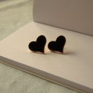 Heart shaped earrings with golden colour edge