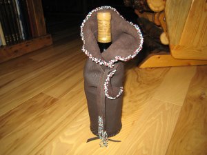 CUSTOM LEATHER WINE COZY, HAND BEADED EDGE