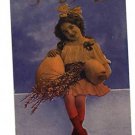 EASTER GIRL ON WALL WITH  LARGE EGGS THEOCHROM POSTCARD