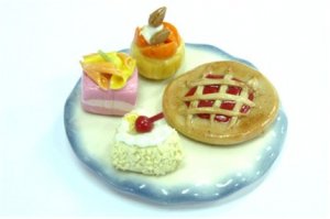 Mini Cake and tart on White and blue plate NBR99