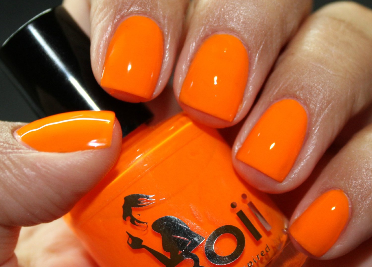 bright orange colored nail polish