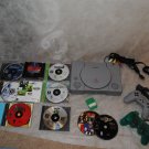 PLAYSTATION W/REMOTE CONTROLS AND GAMES