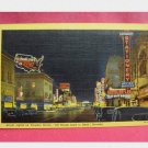 Vintage Linen Postcard - Night Time on Virginia Street in Reno