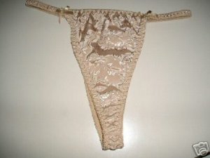 SEXY NEW WITHOUT TAGS BEIGE THONG:  One Size FitsTo 150 Lbs