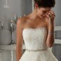 Style Strapless Alencon Lace on a Tulle Wedding Gown with Beaded Organza Sash
