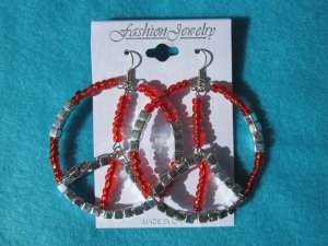 red peace earrings