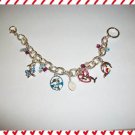 NEW COLORFUL AJMC CUTE DOLPHINS CHARM BRACELET-7-1/2"