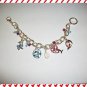 NEW COLORFUL AJMC CUTE DOLPHINS CHARM BRACELET-7-1/2"