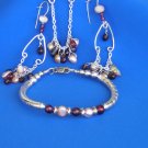 Sterling Silver Champagne  Pearls,and Garnet drop pendant, Earrings and Bracelet.