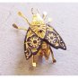 Fly With Patterned Black And Gold Wings