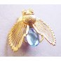 Fly With Large Blue Stone