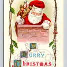 Santa & Toys A Merry Christmas Vintage Embossed Postcard  (eH188)