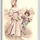 Woman Holding Flowers Walking With Her Son Litho Postcard (eH569)