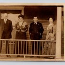 RPPC Well Dressed Family Portrait on Farmhouse Veranda Porch - AZO Postcard (eCL496)