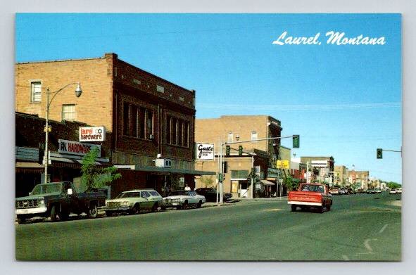 Laurel Montana Main Street - Hardware & Gusts Dept. Store Postcard (O-353)