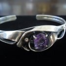 Vintage Silver Ribbon Design with Oval-Cut Amethyst Cuff