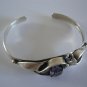 Vintage Silver Ribbon Design with Oval-Cut Amethyst Cuff