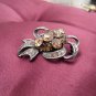 Deep Champagne Austrian Crystals with Chrome Ribbon Brooch Costume Jewelry