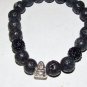 Black Lava Stone Stretch Bracelet W/ Seated Buddha 7.50"