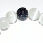 White Cat's Eye Mexican Opal Stretch Bracelet with Antique Silver-Tone Fleur De Lis 7.25"