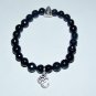 Unisex Faceted Black Onyx Stretch Bracelet With Antique  Silver Tone Seated Buddha and OM 7.50"