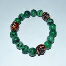 Men's Ruby Zoisite Three Yak Bone Skull Stretch Bracelet 8.0"