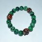 Men's Ruby Zoisite Three Yak Bone Skull Stretch Bracelet 8.0"