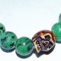 Men's Ruby Zoisite Three Yak Bone Skull Stretch Bracelet 8.0"