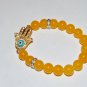 Light Orange 10 MM Jade Hamsa Stretch Bracelet 7.25"