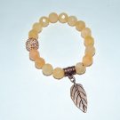 Women's 10 MM Faceted New Jade Stretch Bracelet With Copper Leaf Charm 7.10"