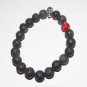 Men's 10 MM Black Lava Stretch Bracelet With Antique Silver-Tone Skull 7.75"