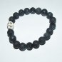 Men's 10 MM Black Lava Stretch Bracelet With Carved Howlite Skull 7.75"