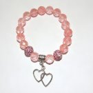 Women's 10 MM Faceted Watermelon Tourmaline Double Heart Stretch Bracelet 7.25"