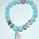 Women's 10 MM Aquamarine Stretch Bracelet with" key to my heart" dangle charm 7.25"